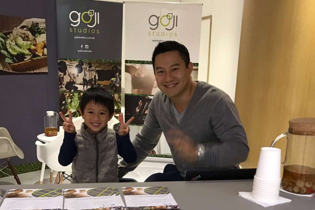Former Hong Kong rugby player Ricky Cheuk and his son in his new fitness centre. Photo: Handout
