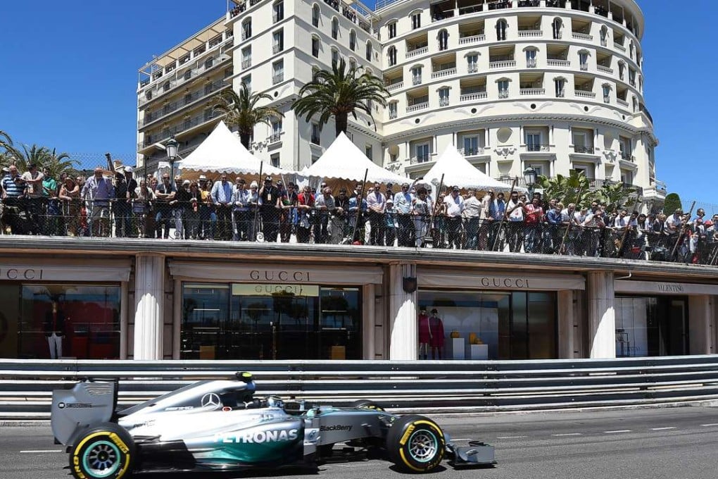 Mercedes' German driver Nico Rosberg drives at the Monaco street circuit during the qualifying session of the Monaco Formula One Grand Prix in Monte Carlo on May 24, 2014. Photo: AFP/ANNE-CHRISTINE POUJOULAT
