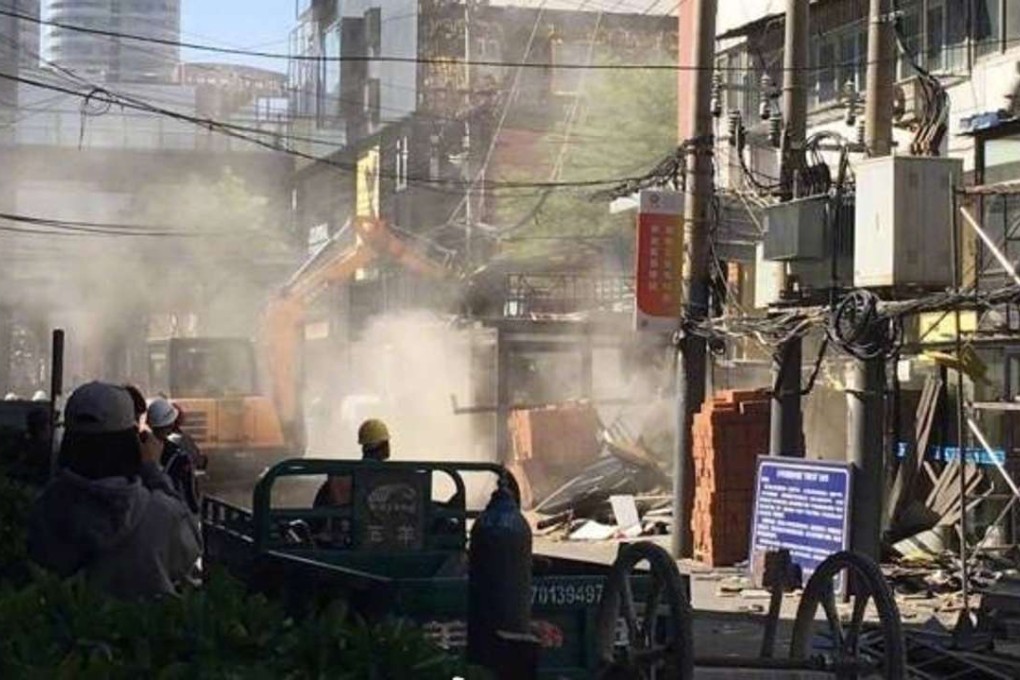 Demolition workers in Sanlitun. Photo: Handout