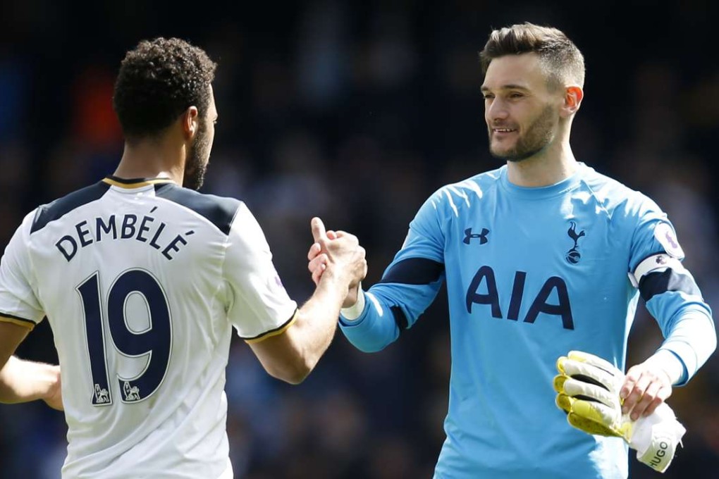 Tottenham Hotspur goalkeeper Hugo Lloris (right) celebrates with Mousa Dembele. Photo: Reuters