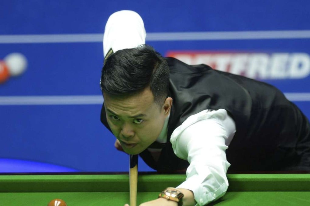 Hong Kong’s Marco Fu battled his way into the world championship quarter-finals with a win over Neil Robertson at the Crucible in Sheffield. Photo: AP