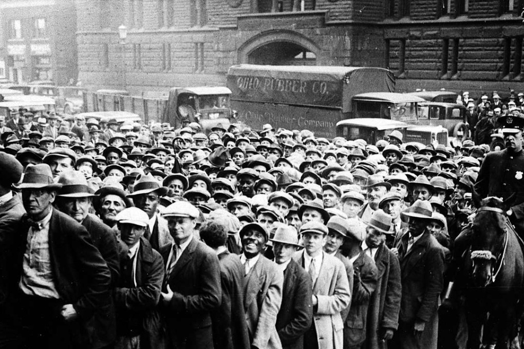 Central bankers are deploying quantitative easing and other extreme monetary measures to help prevent the economy from imploding. Thousands of job seekers gather to apply for government jobs during the Great Depression in Cleveland, Ohio, in 1930. Photo: AP