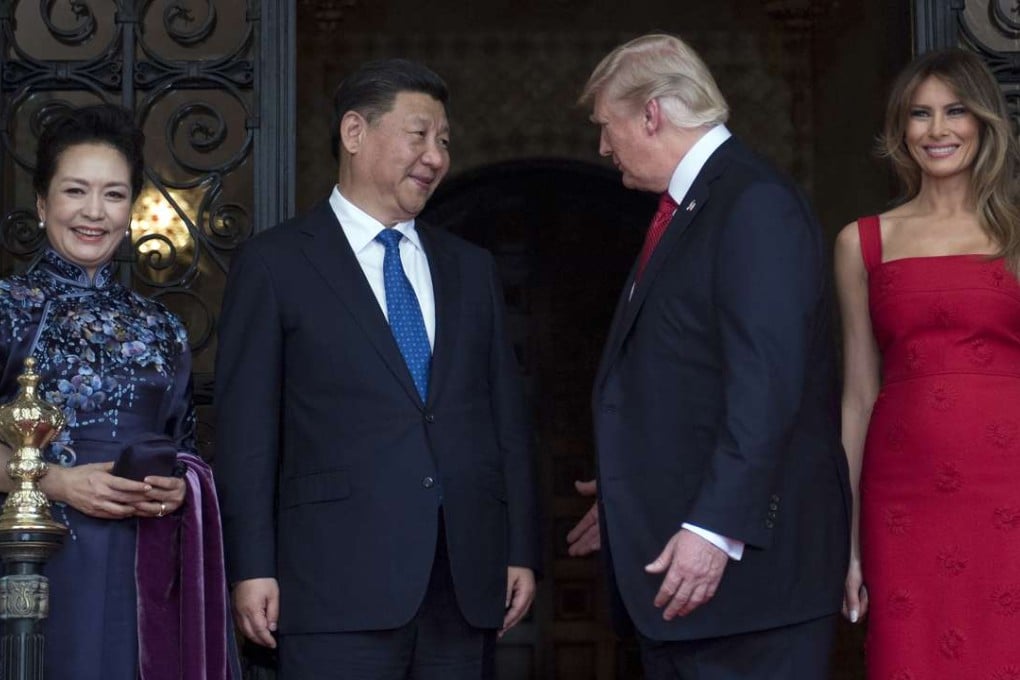 Chinese President Xi Jinping and his wife Peng Liyuan (left) meet US President Donald Trump and US First Lady Melania Trump (right) at the Mar-a-Lago estate in West Palm Beach, Florida, on April 6. Photo: AFP