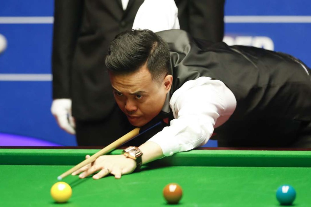 Hong Kong's Marco Fu is a picture of concentration against England’s Mark Selby. Photo: Xinhua