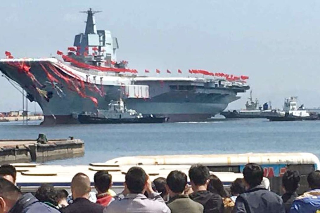 China's first domestically built aircraft carrier is launched at a shipyard in the northeastern port city of Dalian on April 26, 2017. Photo: Kyodo