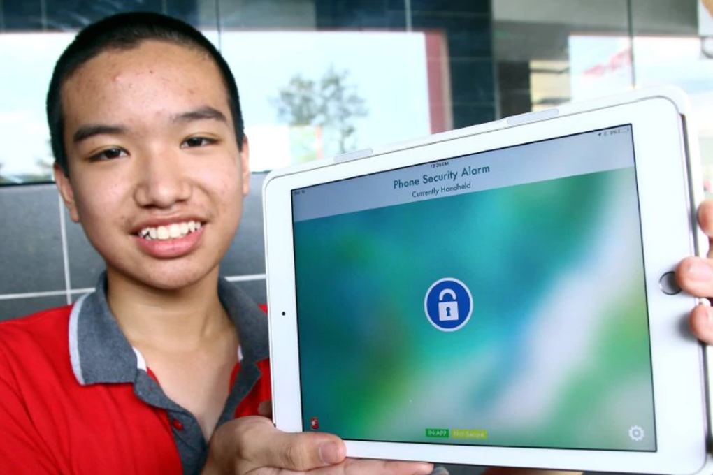 Lim showing off the anti-theft app on his tablet. Photo: Amir Irsyad Omar