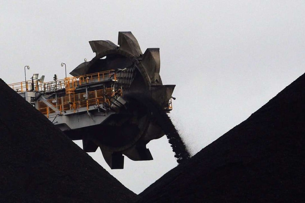 A reclaimer machine at a coal port in Australia. The planned Carmichael mine in Queensland is facing mounting opposition. Photo: Reuters