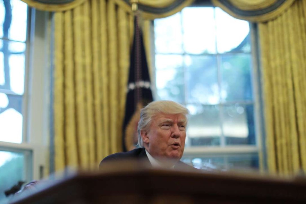 US President Donald Trump speaks during an interview in the Oval Office of the White House in Washington on Thursday. Photo: Reuters