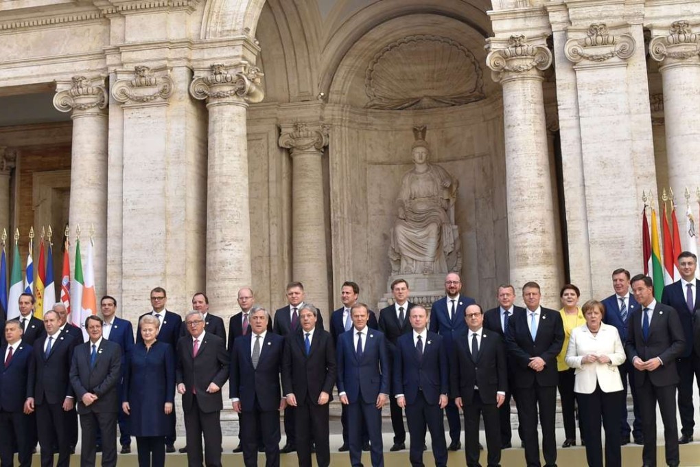 Chancellor Angela Merkel of Germany (in white jacket) poses with European Union leaders during a special summit to mark the 60th anniversary of the bloc's founding agreement, the Treaty of Rome, at the Capitoline Hill in Rome on March 25. Photo: AFP