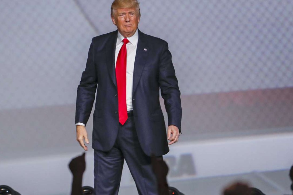 US President Donald J. Trump reacts after speaking to the National Rifle Association Leadership Forum at the Georgia World Congress Centre in Atlanta, Georgia. Trump is the first sitting president to address the NRA since Ronald Reagan. Photo: EPA