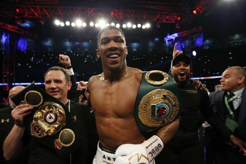 Anthony Joshua celebrates his victory. Photo: Reuters