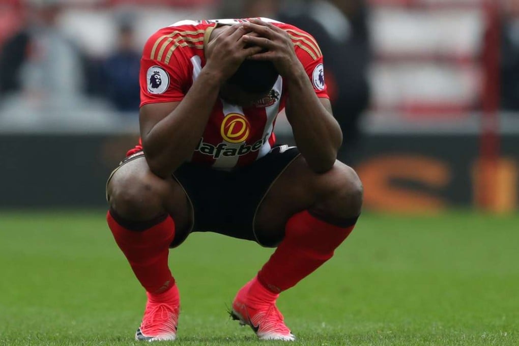 Sunderland's Victor Anichebe looks dejected after the Black Caps are relegated from the Premier League after their defeat by Bournemouth at the Stadium of Light. Photo: Reuters