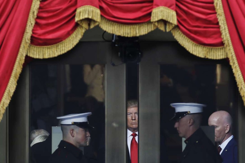 Donald Trump on Day 1 of his presidency: at his inauguration at the US Capitol in Washington. Photo: AP