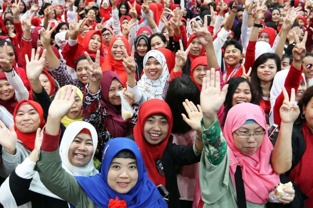 Thousands of Indonesians packed a hall at the AsiaWorld-Expo, to see Widodo. Photo: Edward Wong