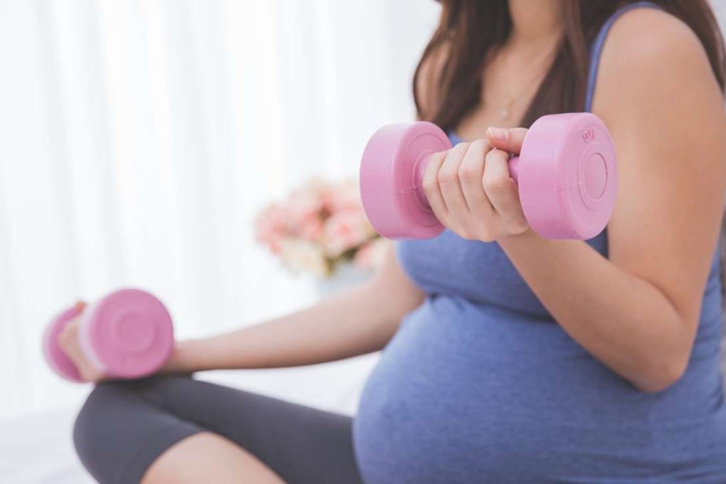 Lifting weights will not increase the chances of a miscarriage, but mums-to-be should be careful not to injure their back muscles during this important time. Photo: Shutterstock