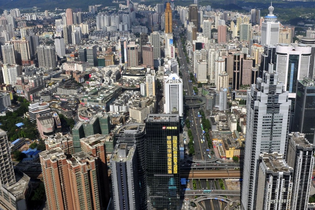 ***ONE TIME USE ONLY*** View of clusters of skyscrapers, high-rise office and residential apartment buildings in Shenzhen city, south Chinas Guangdong province, 10 August 2010. Shenzhen, Chinas first special economic zone (SEZ), plans to explore new economic development methods as well as improve its citizens happiness index in its future, Shenzhen Party Chief Wang Rong said. The economic zone will restructure its economic pattern and take the scientific development path to build itself into an international metropolitan, capable of competing with Hong Kong, Singapore as well as big cities in the US and Europe, said Wang. Shenzhen, which was originally a coastal village, took off economically after it was approved to become an SEZ on August 26, 1980. Now the city is among Chinas most developed regions and boasts a per capita GDP of US$13,600 in 2009. [15JUNE2014 CONTENTS FEATURE 1 POST MAGAZINE]
