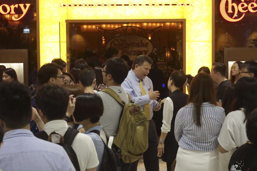 Customers queue up for the The Cheesecake Factory in Harbour City, Tsim Sha Tsui, on its opening day. Photo: May Tse