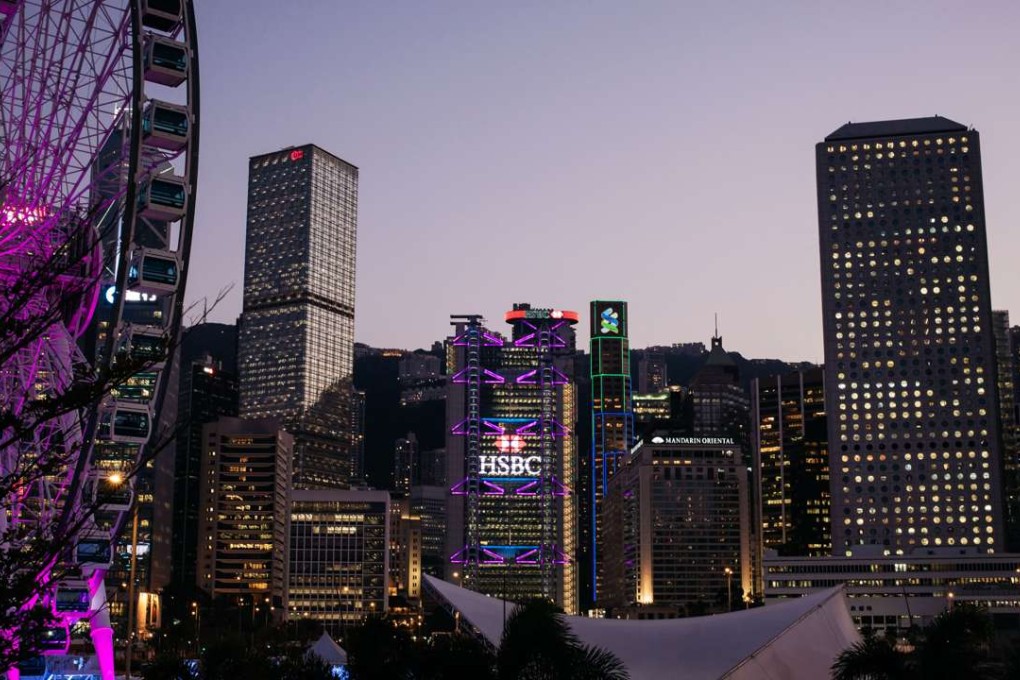 HSBC headquarters and the Standard Chartered Bank building at dusk in Central on February 13. Hong Kong has always served as a trusted broker for its well-established and transparent system of doing business. Photo: Bloomberg