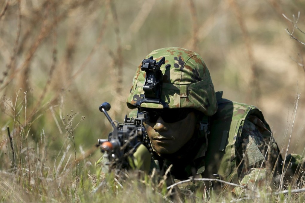 Prime Minister Shinzo Abe has revealed a 2020 plan to include existence of the military in the first-ever change to Japan’s pacifist constitution. File photo: Reuters