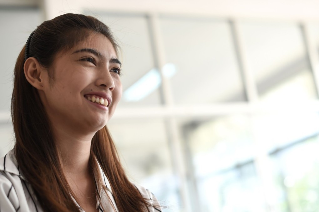 Thai schoolgirl Naruedee Jotsanthia smiles during an interview at the Paveena Foundation in Bangkok. Photo: AFP
