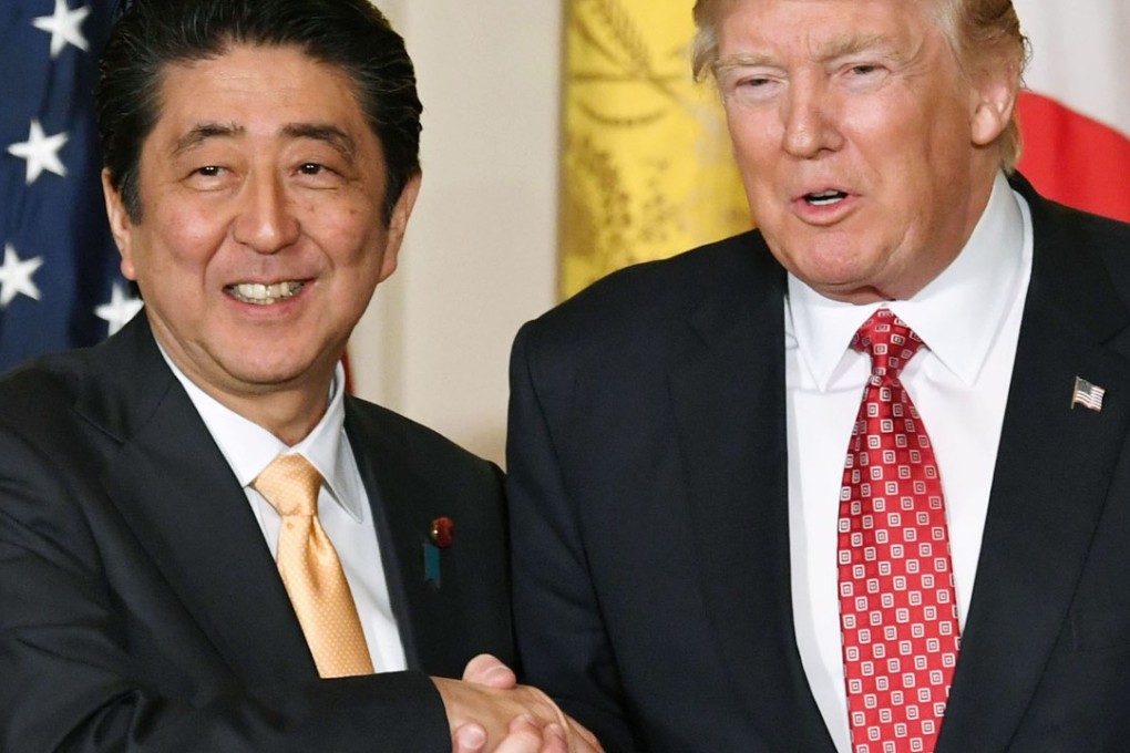 Japanese Prime Minister Shinzo Abe and US President Donald Trump after a joint press conference at the White House on Februrary 10. Photo: Kyodo