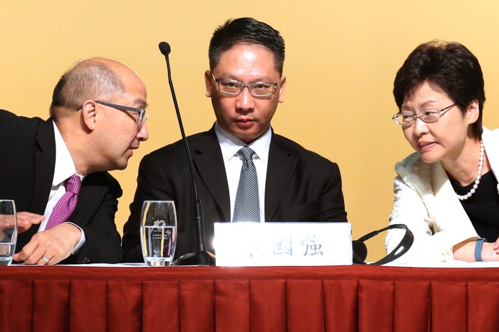 Then chief secretary Carrie Lam, Secretary for Justice Rimsky Yuen Kwok-keung (centre) and Constitutional and Mainland Affairs chief Raymond Tam Chi-yuen at AsiaWorld Expo on September 1, 2014. Lam is expected to be left with Hong Kong’s long-overdue task of securing a judicial assistance agreement with the mainland, as Yuen recently said this will still “take some time”. Photo: Sam Tsang