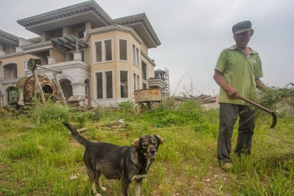 Gao, 75, and his pet dog are the only residents of a ghost town in Chaohu, Anhui province. Photo: Handout