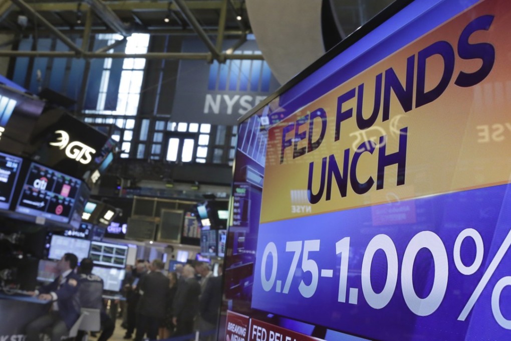A television screen on the floor of the New York Stock Exchange shows the rate decision of the Federal Reserve, Wednesday, May 3, 2017. The Federal Reserve is leaving interest rates unchanged, while signalLing that it expects a resilient US economy and solid job market to justify further rate hikes later this year. Photo: AP