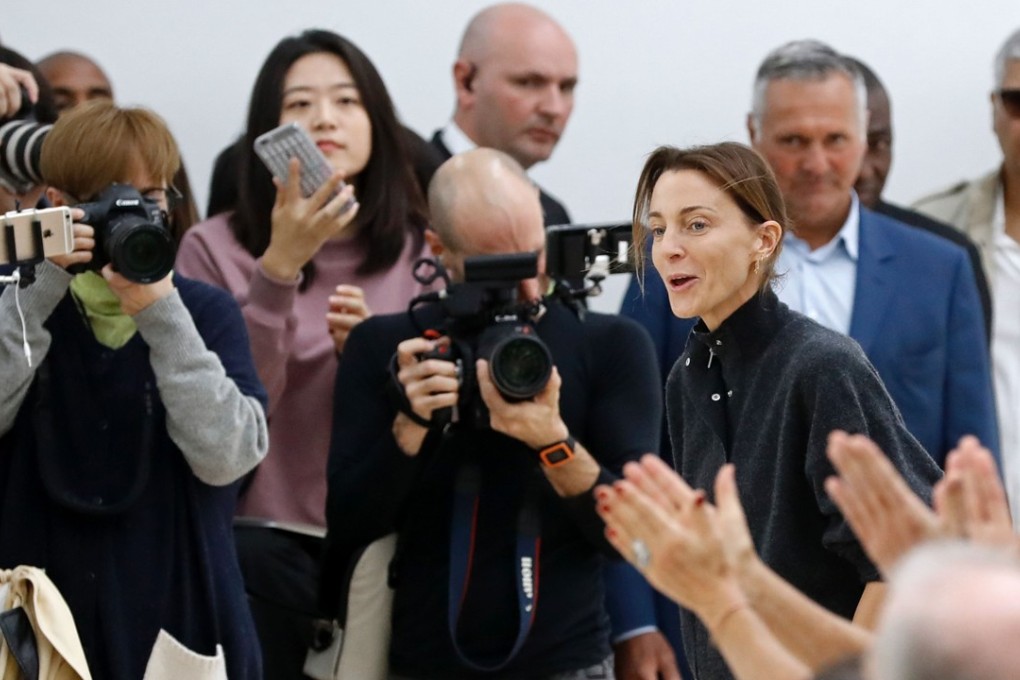 Fashion designer for Céline, Phoebe Philo, acknowledges the audience after her 2017 spring/summer ready-to-wear collection fashion show in Paris in October. Photo: AFP