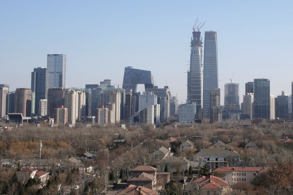 China’s big challenge is to orchestrate an orderly unwind of a US$3 trillion credit bubble. The skyline of Beijing's central business area. Photo: Reuters