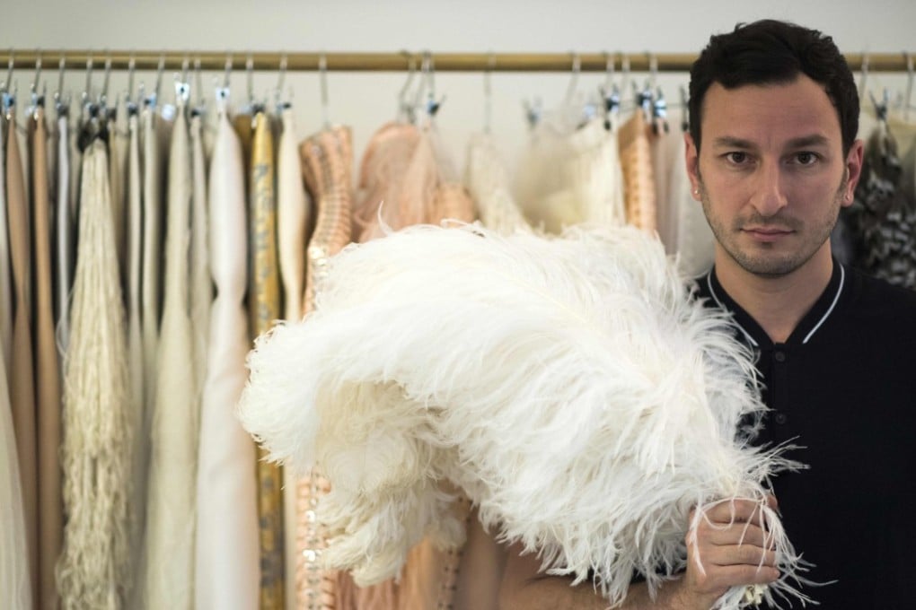 Belgian fashion designer Serkan Cura is one of the world’s top plumassiers, whose creations have graced catwalks from Jean Paul Gaultier to Victoria’s Secret. Photo: AFP
