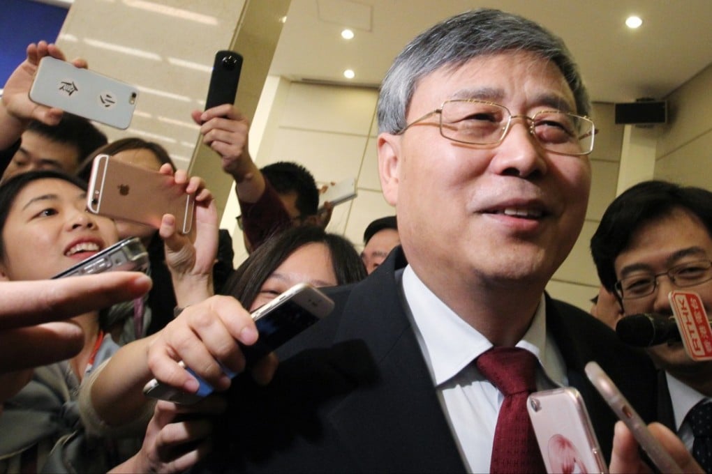 Guo Shuqing, chairman of the China Banking Regulatory Commission, speaks to media shortly after taking on his new role. Photo: Simon Song