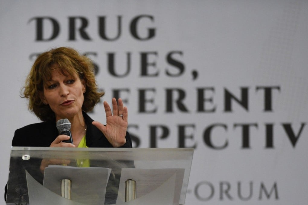 Agnes Callamard gestures as she addresses a narcotics forum at a state-run university in Manila. Photo: AFP