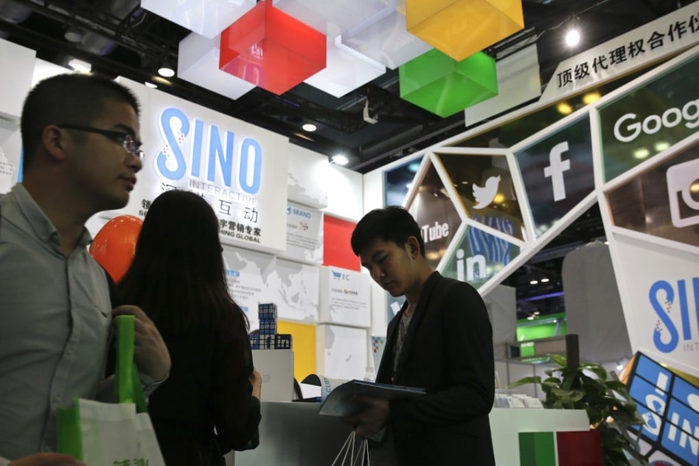 The Communist Party has moved to increasingly limit and guide online discussion. Pictured, visitors to the Global Mobile Internet Conference in Beijing last month. Photo: AP