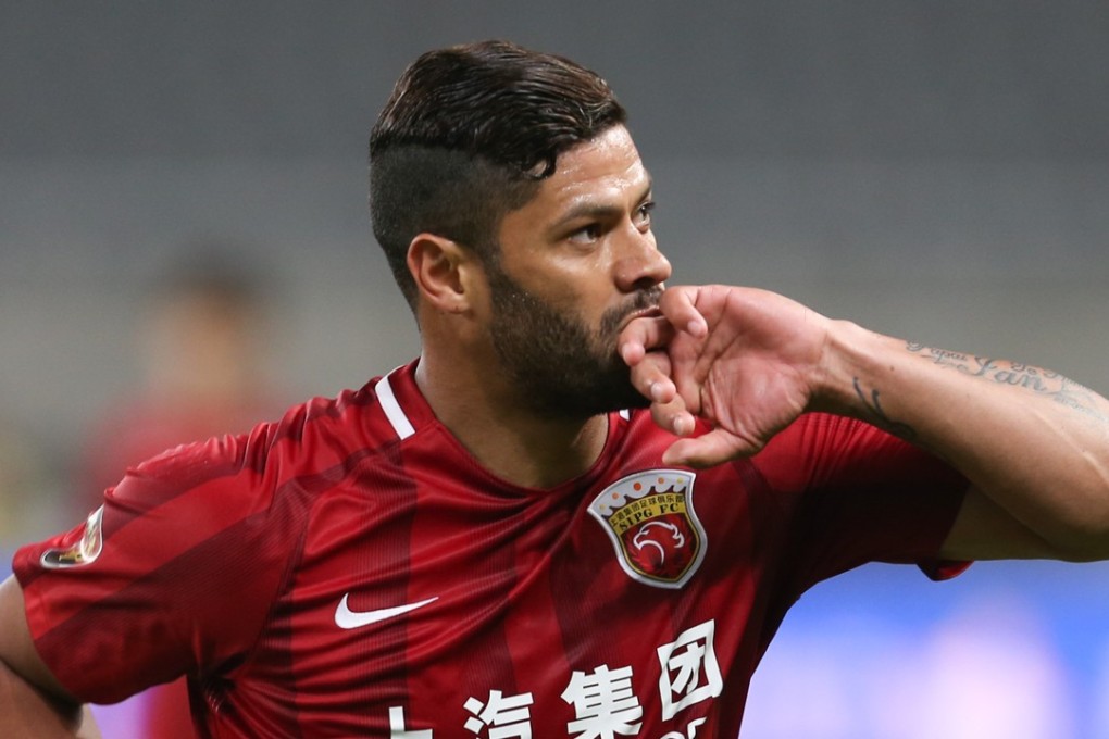 Hulk celebrates scoring for Shanghai SIPG against Guizhou Zhicheng. Photos: Xinhau