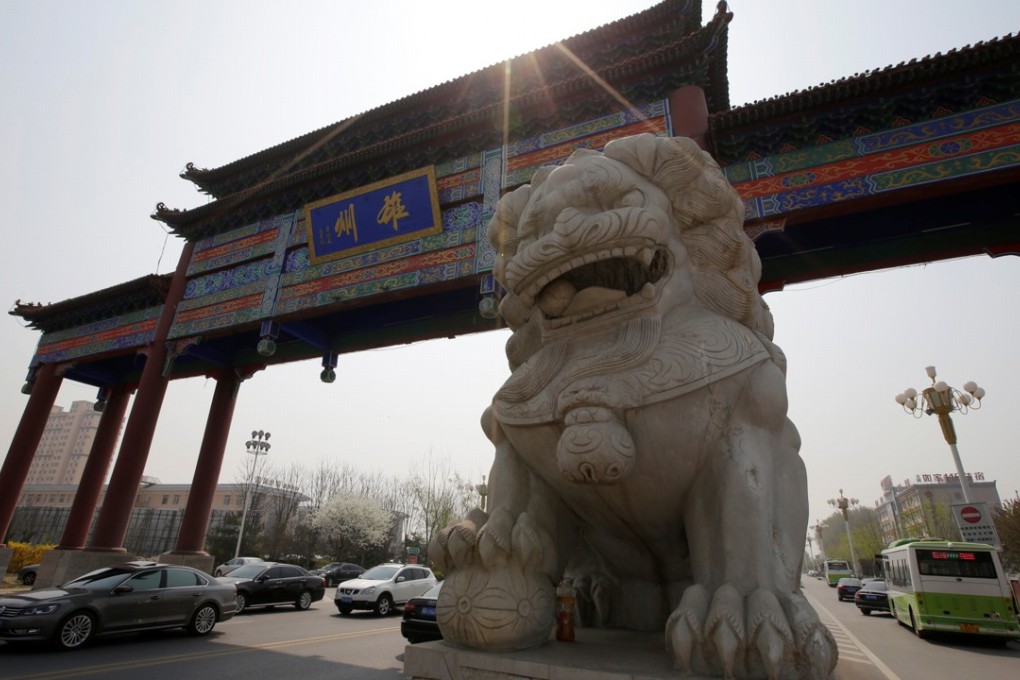 A gate over a street in Xiongxian county, one part of the Xiongan New Area. Photo: Reuters