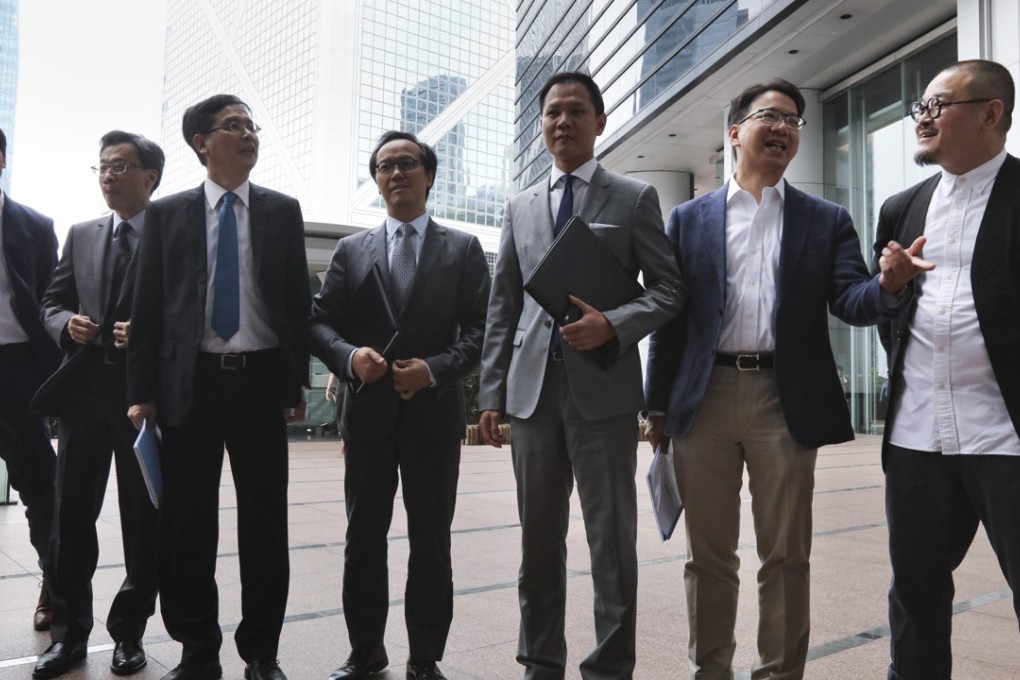 (From left) Edward You Chung-yim, Joseph Lee Kok-long, Ip Kin-yuen, Kenneth Leung, Dennis Kwok Wing-hang, Charles Mok and Shiu Ka-chun from the Professionals Guild are the first group from the pan-democratic camp to meet with chief executive-elect Carrie Lam. Photo: Felix Wong