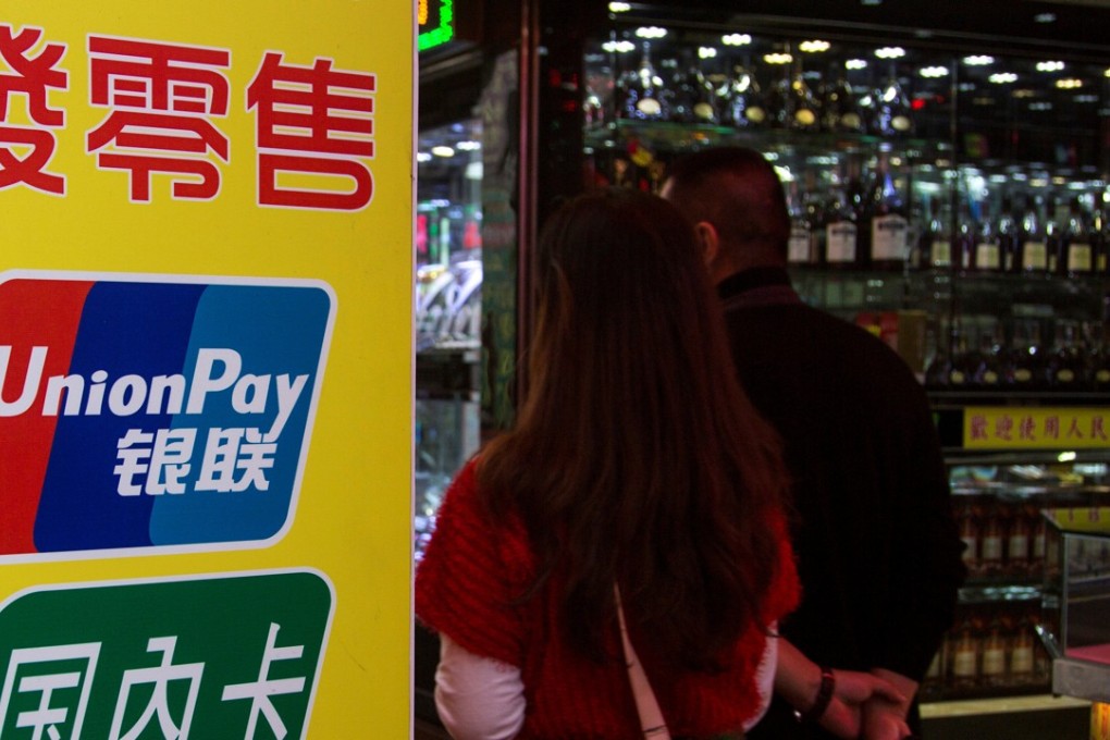 Macau ATM withdrawals have surpassed the HK$10 billion a month mark. Photo: Reuters