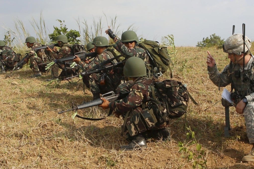 A US soldier gives instructions to his counterparts from the Philippines during the 2015 exercises. File photo: Reuters