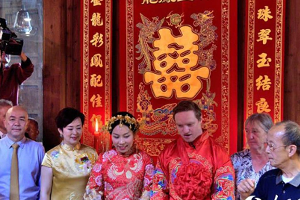 Edward and Liao, the Jiangxi newlyweds, with their family members. Photo: Handout