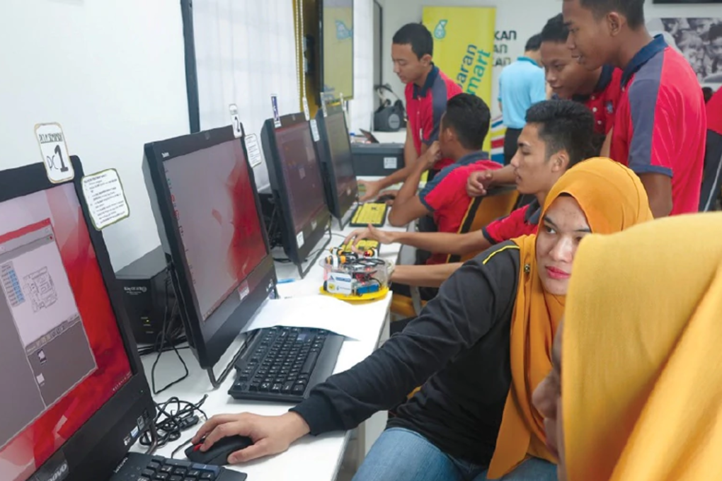 Students at a pilot robotics workshop. Photo: New Straits Times