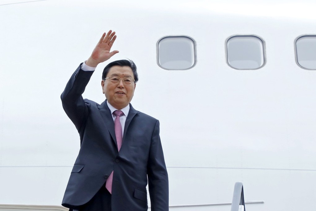 Zhang Dejiang heard a work report by the Macau government on Monday afternoon. Photo: GCS Macau