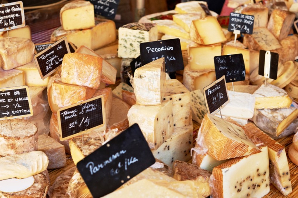 A selction of cheese on sale in a market in Provence, France. Photo: Shutterstock