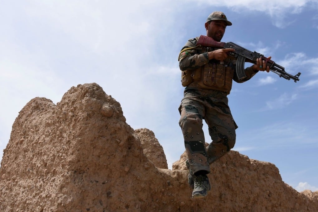 An Afghan security officer takes position during an operation against Islamic State in Chaparhar district, Nangarhar province, Afghanistan, on Monday. Islamic-State-sponsored terrorism poses a major challenge to the stability of Afghanistan and Pakistan. Photo: EPA