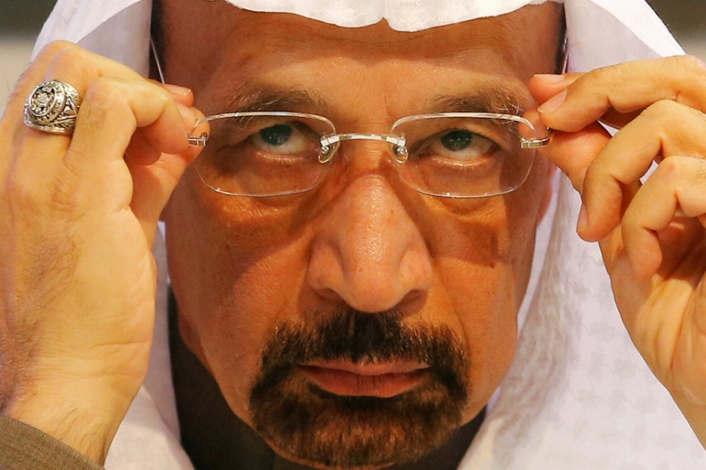 Saudi Arabia's Energy Minister Khalid al-Falih adjusts his glasses during a news conference after a meeting of the Organisation of the Petroleum Exporting Countries (OPEC). The Minister said his country is willing to extend oil production cuts into 2018. Photo: Reuters