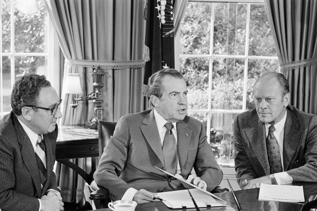 In this October 13, 1973 file photo, then-vice presidential nominee Gerald R. Ford, right, listens as President Richard Nixon, accompanied by Secretary of State Henry Kissinger, speaks in the Oval Office of the White House in Washington. Photo: AP