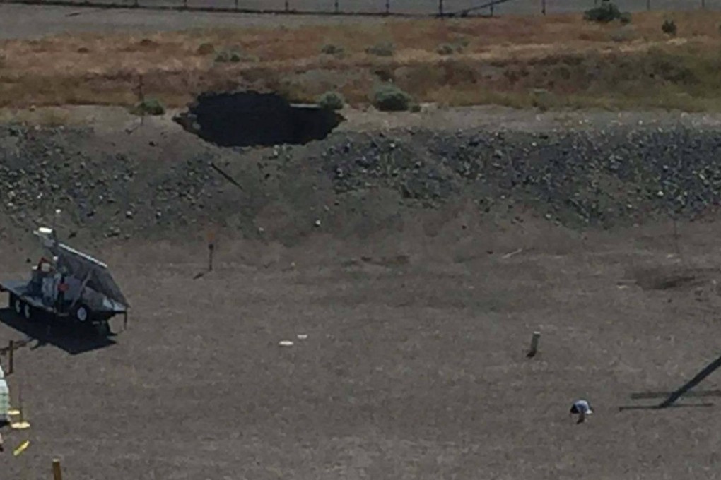 A six-metre wide hole over a decommissioned plutonium-handling rail tunnel is shown at the Hanford Nuclear Reservation in Washington on Tuesday, in this photo provided by the US Department of Energy. Photo: Reuters