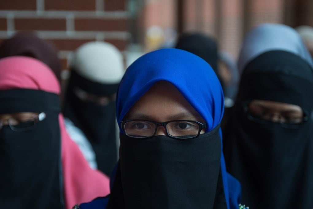 Malaysia is debating a controversial bill to give its sharia courts greater powers. Photo: AFP