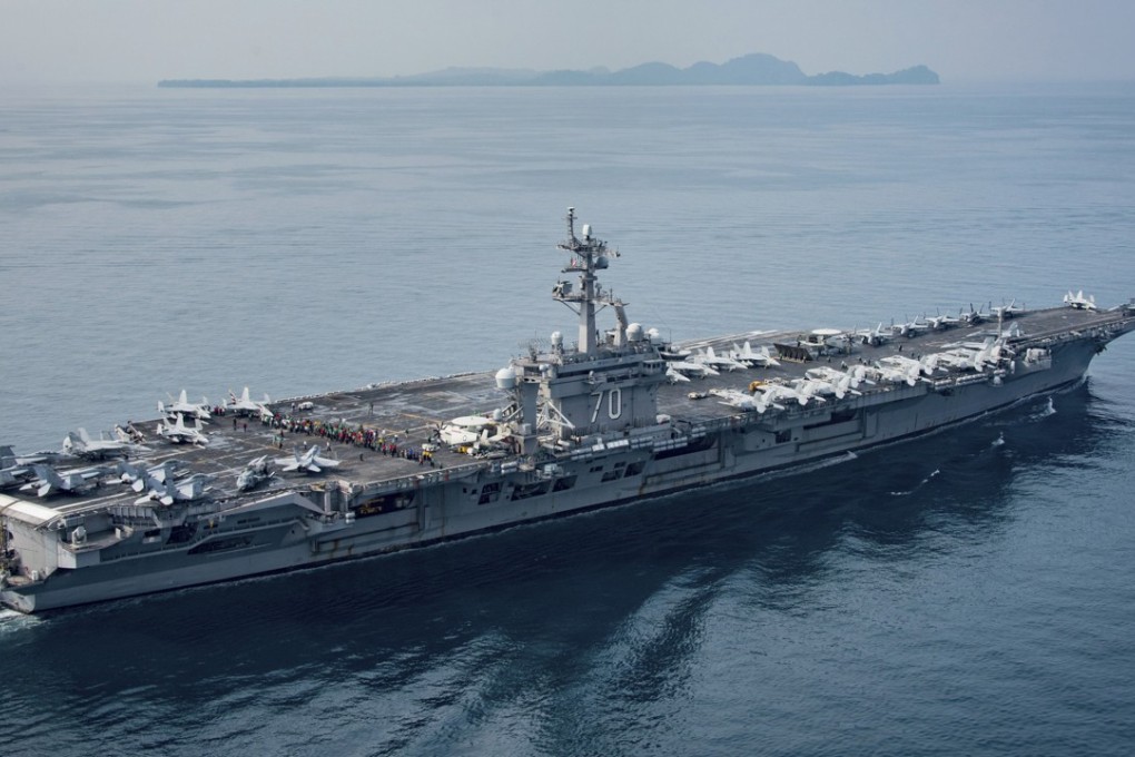 The US Navy, the aircraft carrier USS Carl Vinson transits the Sunda Strait between the Indonesian islands of Java and Sumatra as the carrier strike group is on a scheduled western Pacific deployment. The US said it has ongoing freedom of navigation operations in the South China Sea. Photo: US Navy via AP