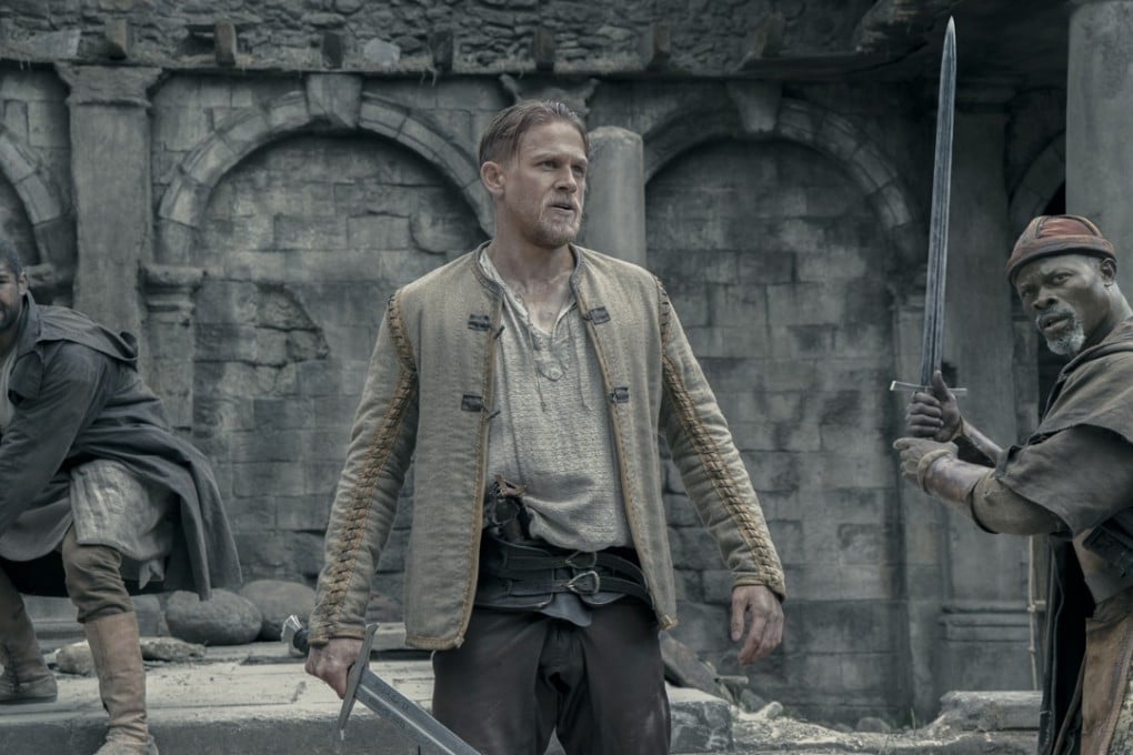 Charlie Hunnam as the title character in King Arthur: Legend of the Sword (category IIB), directed by Guy Ritchie and co-starring Jude Law.